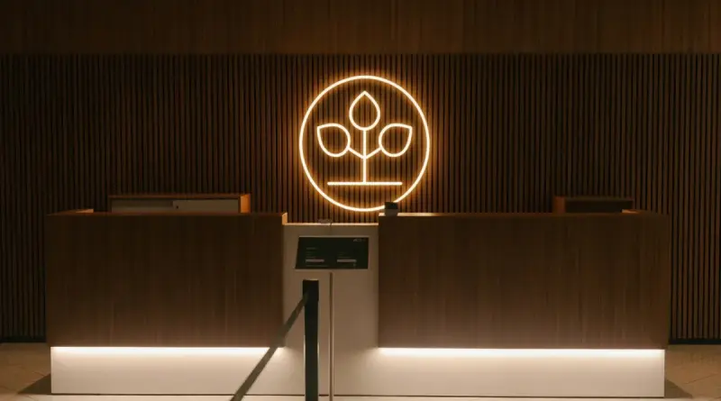 AOK LED neon logo sign reception area custom illuminated signage